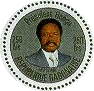 timbre rond émis en 1985 : Président Bongo, Gabon